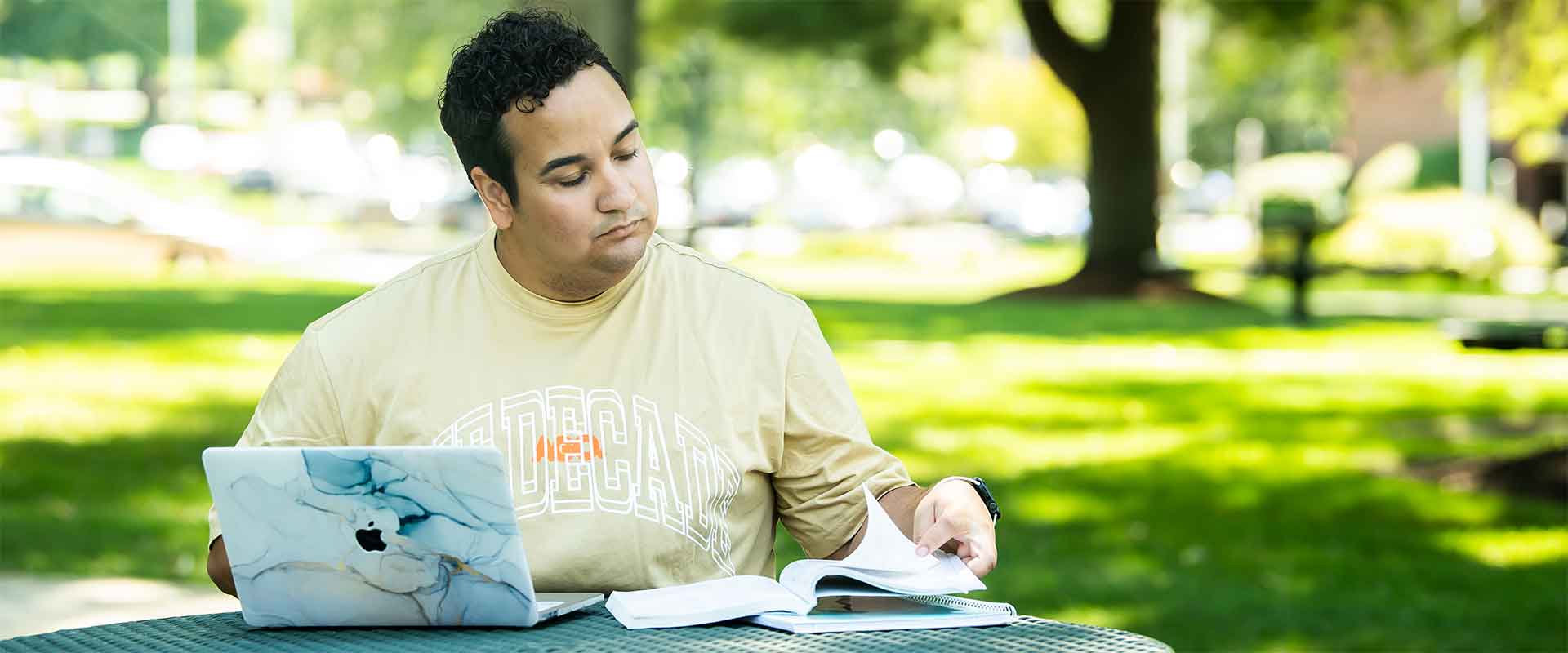 student studying outdoors