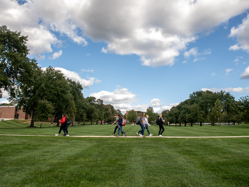 students walking on campus