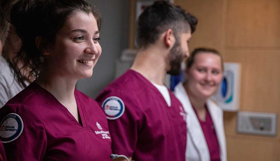 student nurse taking notes