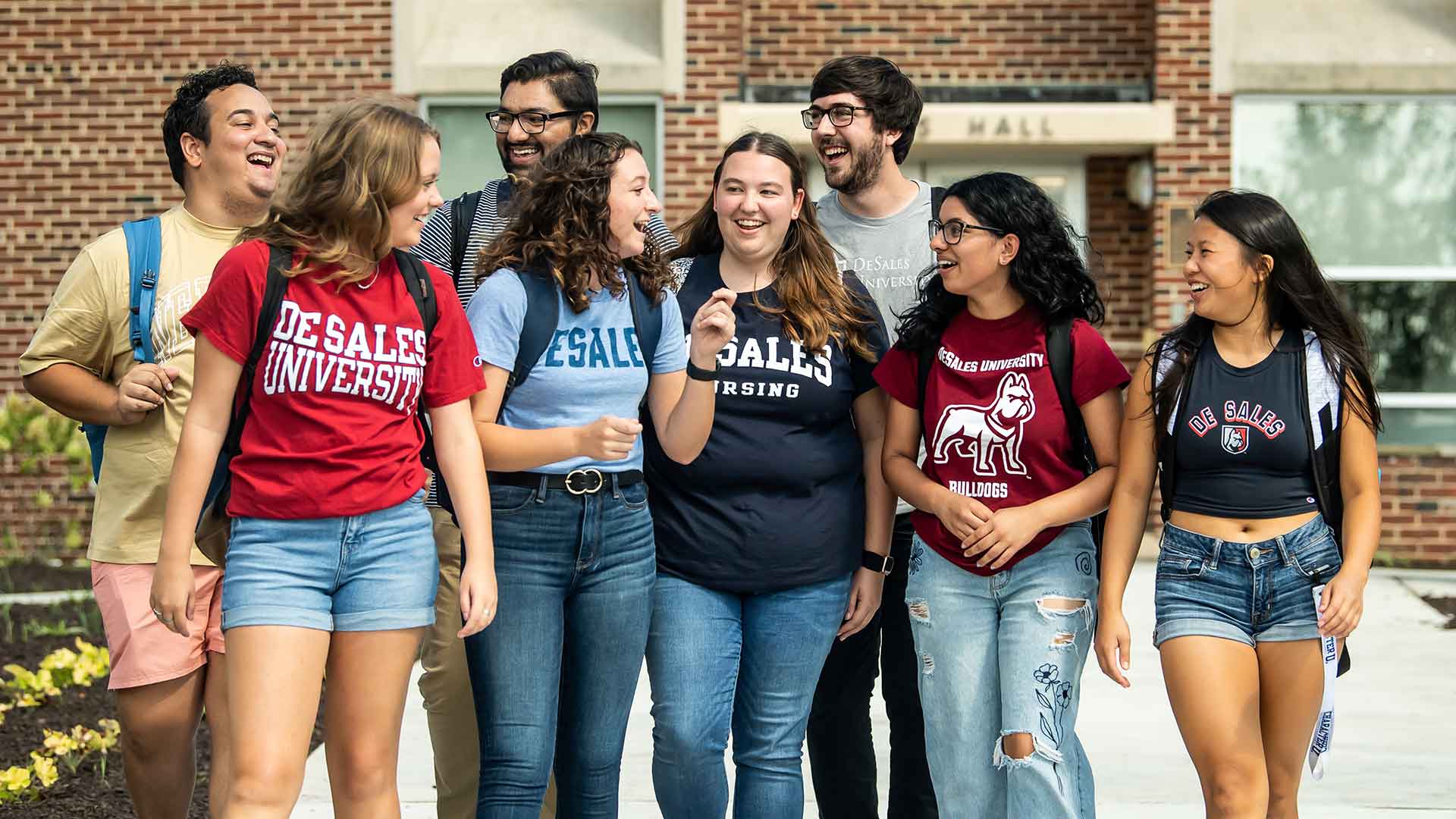 group of students walking on campus