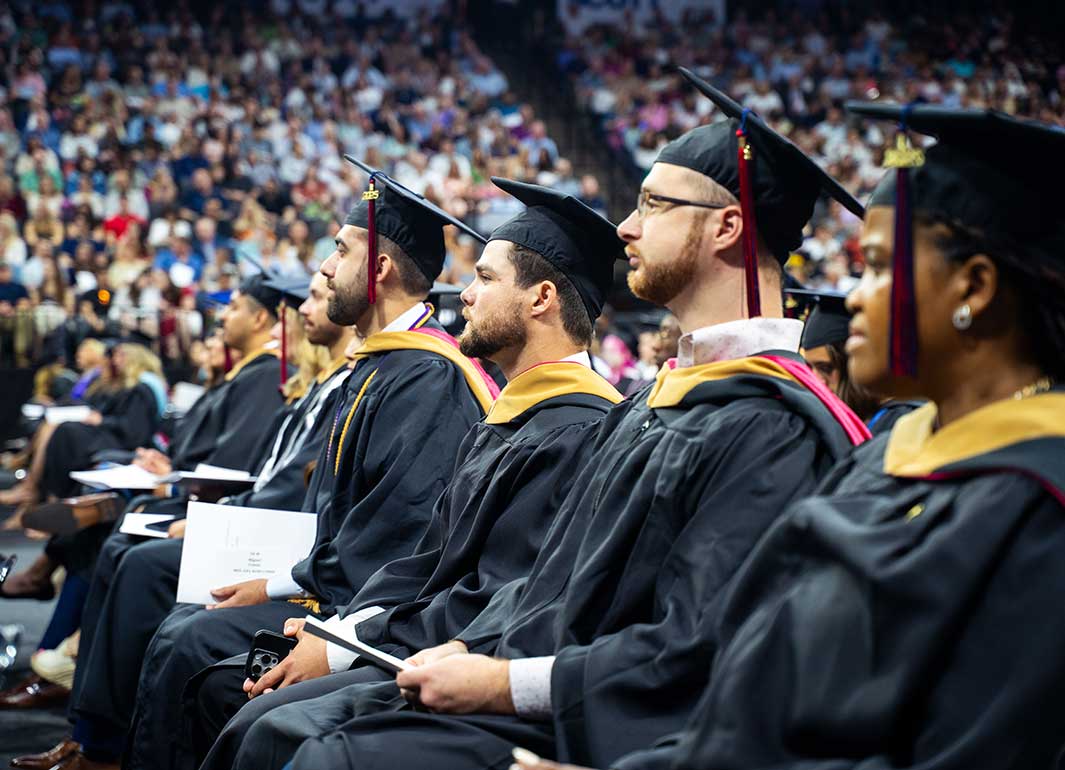 students sitting during commencement ceremony