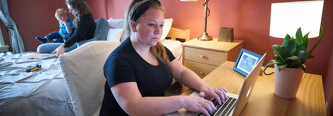 female student doing classwork from home