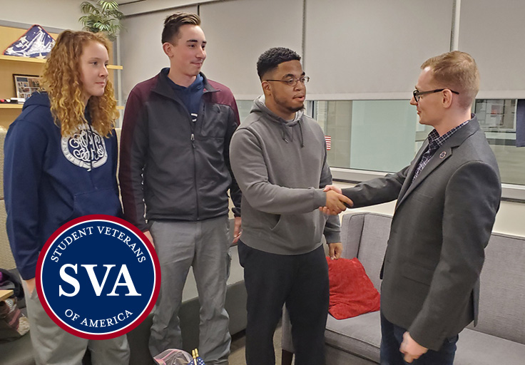 Three student presidents in the veteran's lounge