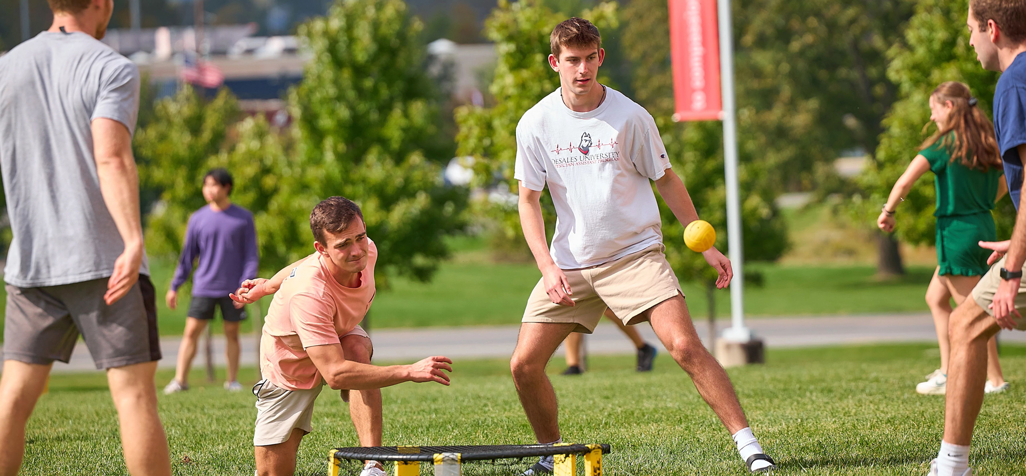 DeSales University students playing spikeball.