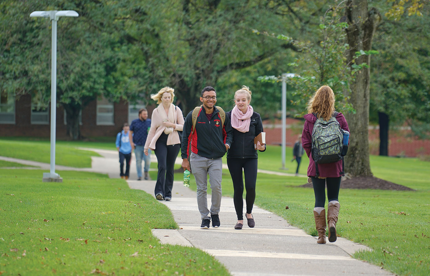 undergrads walking on campus