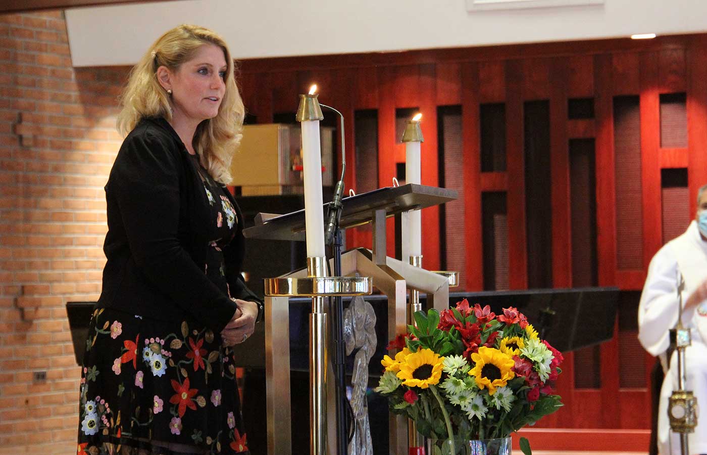 Semi-Famous Poet Kristin Laudenslager reciting a poem at Mission Convocation