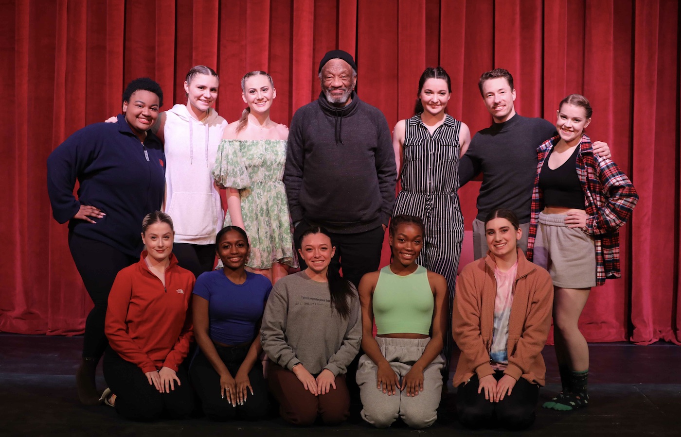 Donald Byrd posing with dance students and faculty