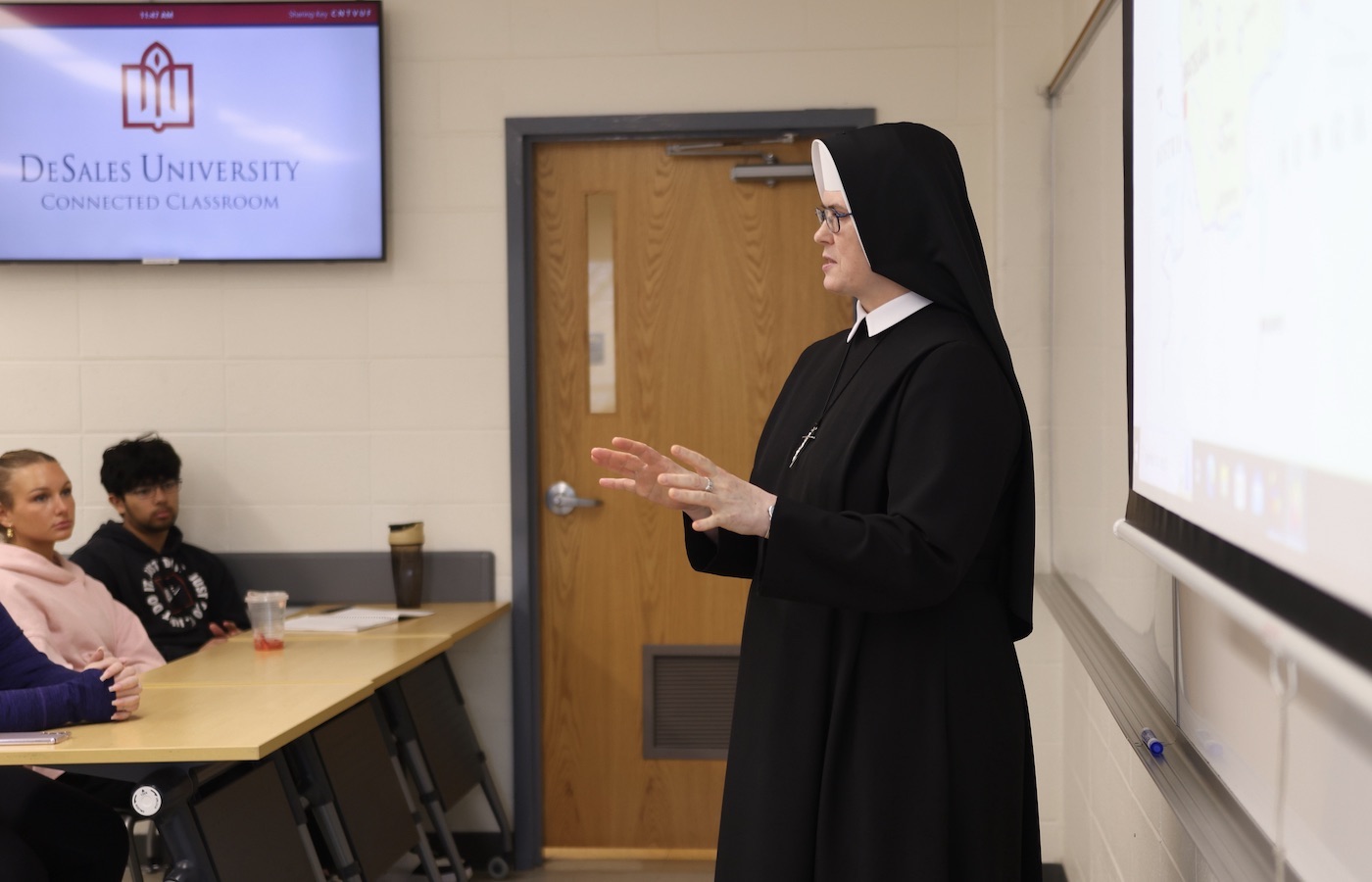 Sister Viannea Marekova speaking to students in Andrew Essig's class