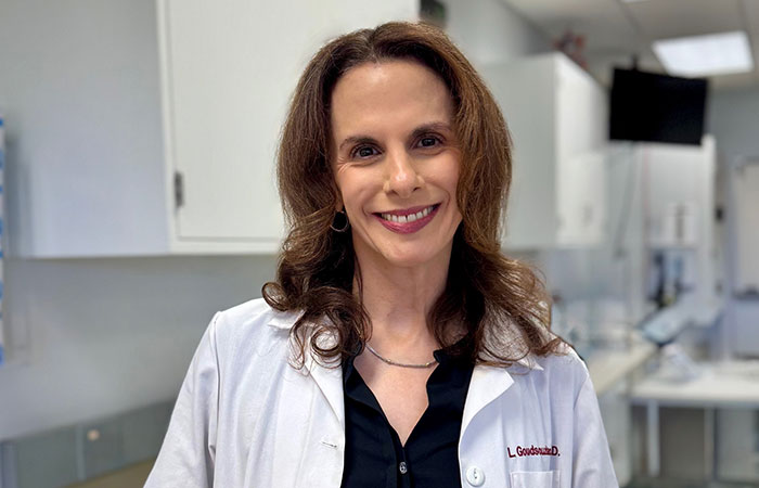 doctor lara goudsouzian wearing a lab coat