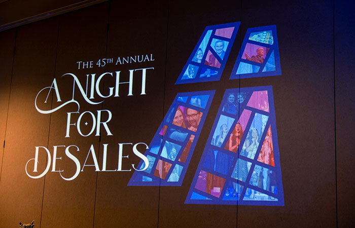 night for desales logo projected onto wall