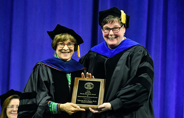 tahereh hojjat being awarded the provost award by terese wignot